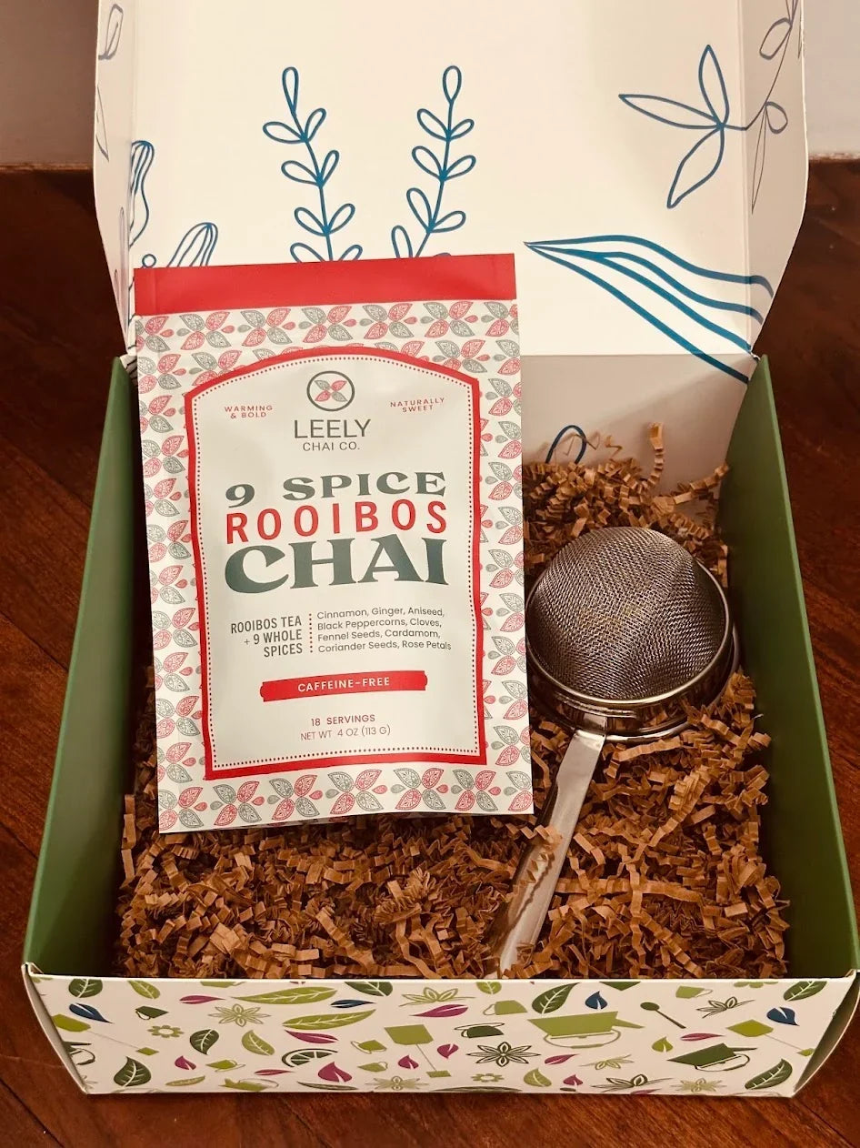 Leely Chai Co. Rooibos Chai Starter Gift Box featuring a 9 Spice Rooibos Chai blend and stainless steel tea strainer in a ready-to-gift package.